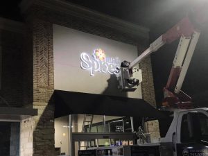 Sun City Lighted Signs illuminated cabinet channel letters outdoor install 300x225